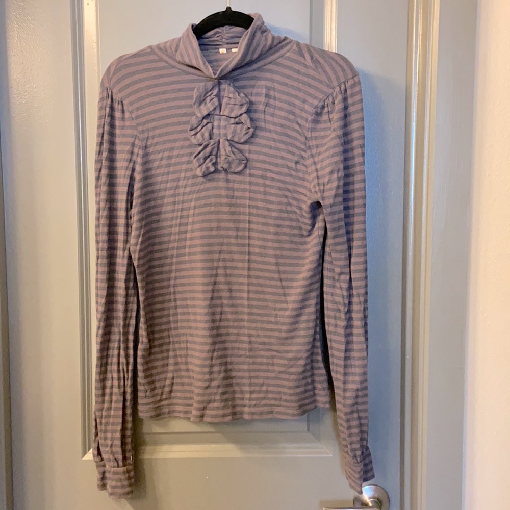 Long sleeve, size small blouse with bow detailing.
